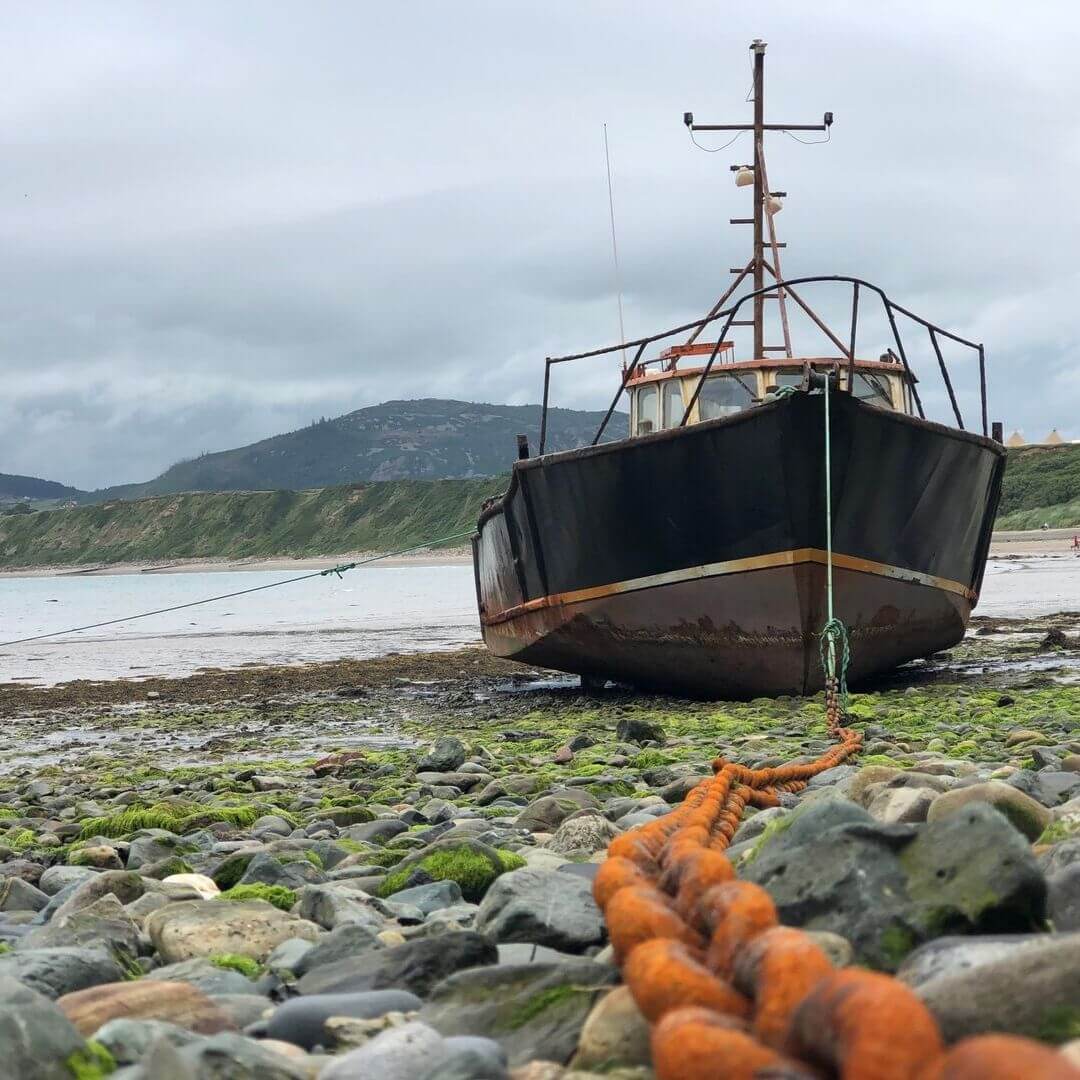 Old Boat Moored Up At Nefyn Beach, North Wales