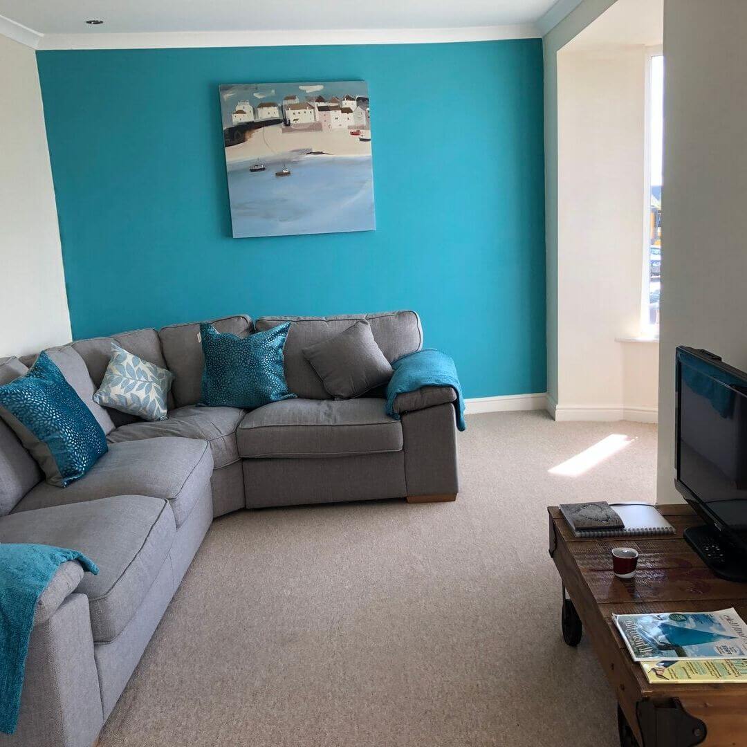 comfy green sofa at holiday home in north wales