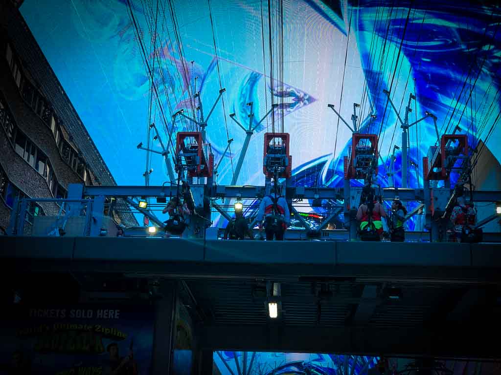 family sat in a zipwire at fremont street