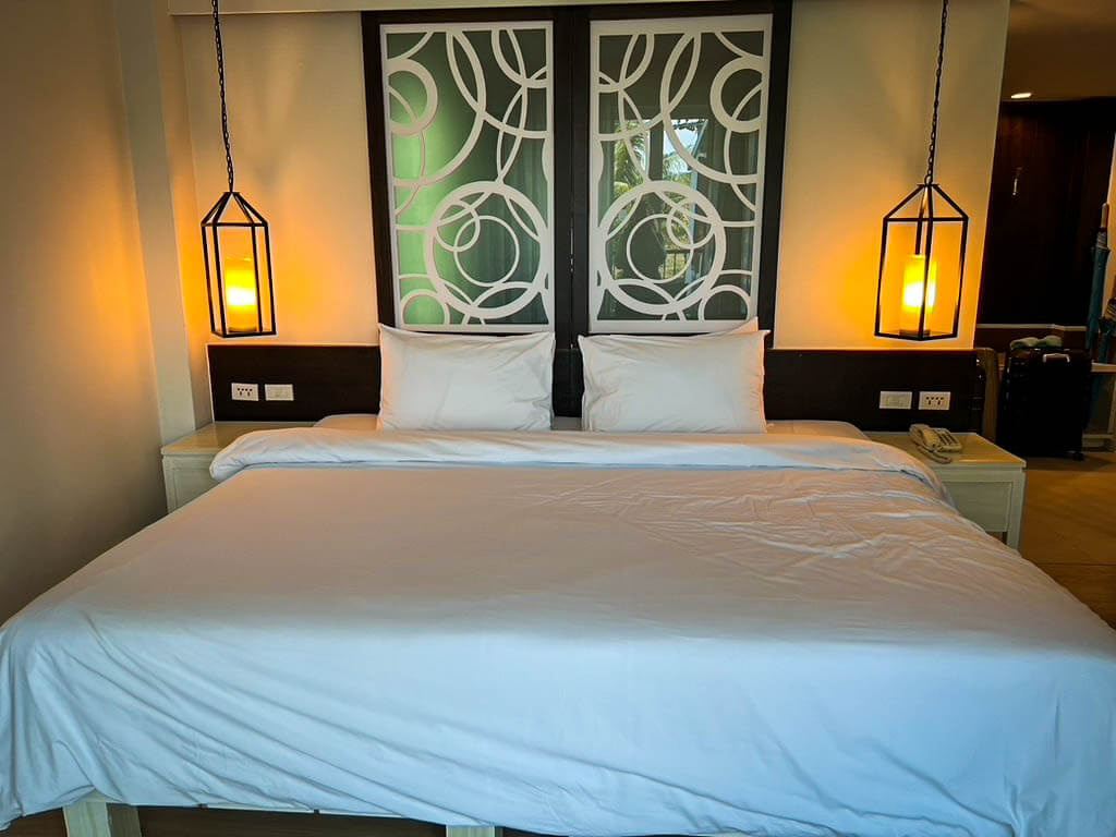 huge bed in a pool acess room at The Waters Khao Lak